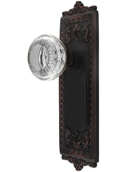 Egg and Dart Style Door Set with Ovolo Crystal-Glass Knobs in Timeless Bronze.